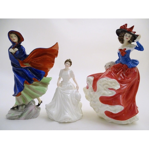 93 - Three Royal Doulton figurines depicting women, Janet, model no. 4042, May, model no. 2746, and Harmo... 