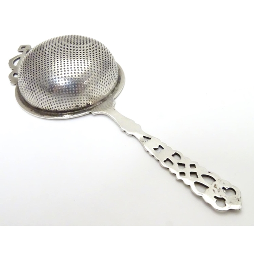 178 - A silver tea strainer hallmarked Birmingham 1930 maker Hammond, Turner & Sons 6 1/2