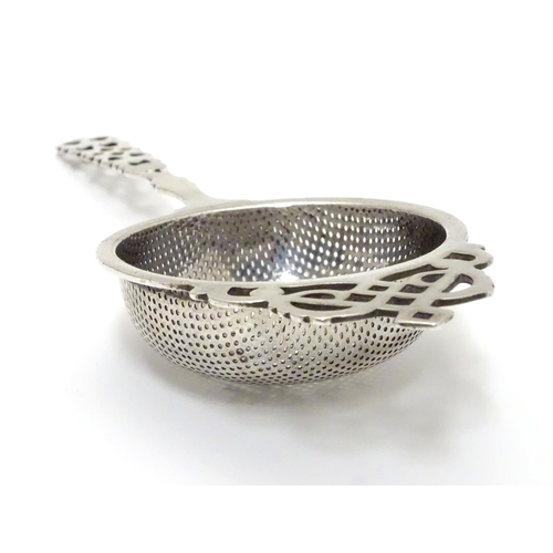 178 - A silver tea strainer hallmarked Birmingham 1930 maker Hammond, Turner & Sons 6 1/2