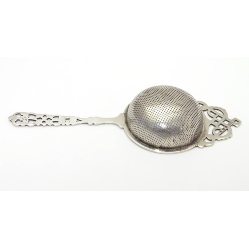 178 - A silver tea strainer hallmarked Birmingham 1930 maker Hammond, Turner & Sons 6 1/2