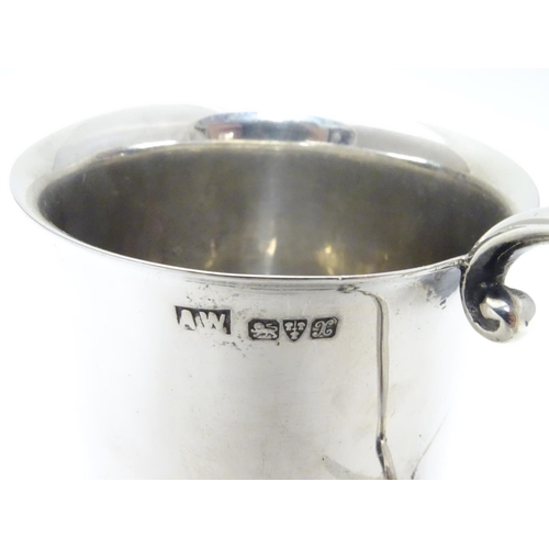 187 - A silver christening mug hallmarked Chester  with scroll handle Chester 1923 maker AW. 3