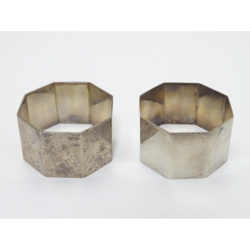 191 - A pair of silver napkin rings of octagonal form. Hallmarked Birmingham 1954 maker Barker Brothers Si... 