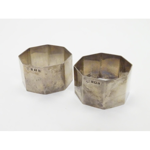 191 - A pair of silver napkin rings of octagonal form. Hallmarked Birmingham 1954 maker Barker Brothers Si... 