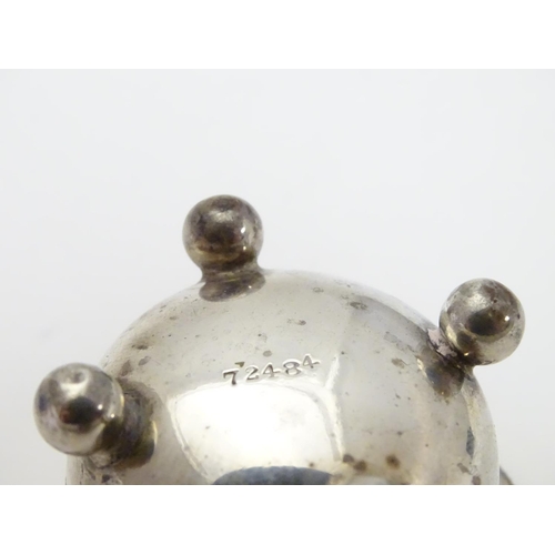 219 - A Victorian silver salt of quatrefoil shape raised on four spherical feet. Hallmarked London 1898 ma... 