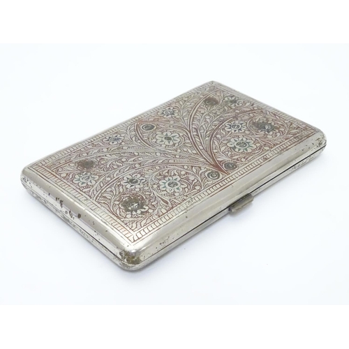 222 - A white metal cigarette case, the eastern/ Islamic style decoration having red and green enamel styl... 