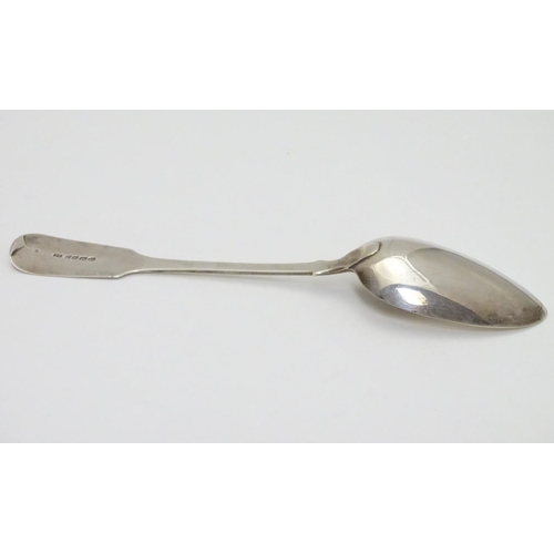 227 - A William IV silver fiddle pattern table spoon hallmarked  Exeter 1831 maker Jonathan Ramsey 8 1/2