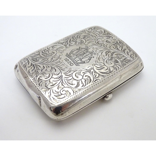 233 - A silver cigarette case of shaped form with engraved acanthus scroll decoration. Hallmarked Birmingh... 