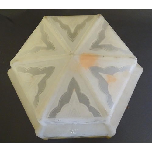 145 - An Art Deco glass pendant lampshade, of stepped, hexagonal form with etched cloudburst decoration an... 