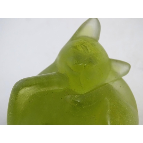 153 - A Daum pâte de verre art glass model of a sleeping cat ('Le Chat Endormi'). Signed under. 2 1/8