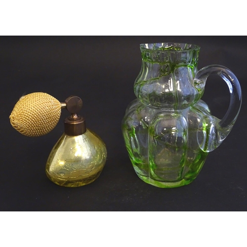 163 - A mid-20thC perfume atomiser, with gold craquelure finish, together with an early 20thC water jug wi... 