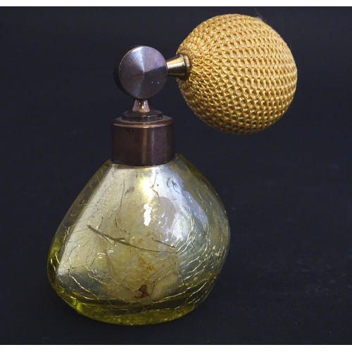 163 - A mid-20thC perfume atomiser, with gold craquelure finish, together with an early 20thC water jug wi... 