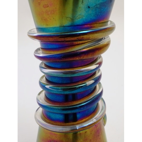 163A - A large 19thC Arts & Crafts glass vase, decorated with a spiral belt and iridescent finish. 13 1/4