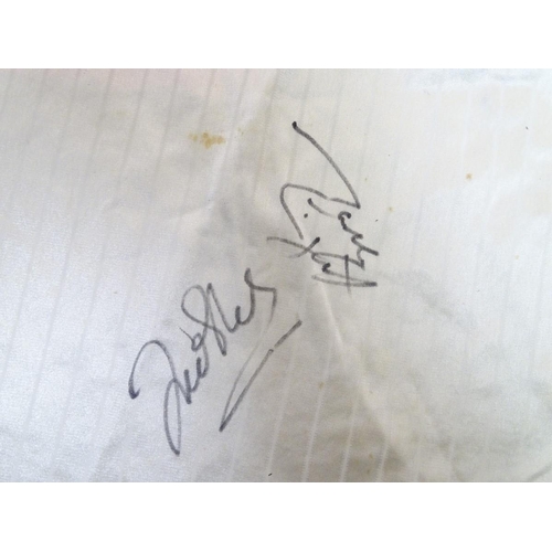 87 - Football: A Child's size 1986 England shirt, signed by: Bobby Robson , Peter Beardsley , Gary Lineke... 