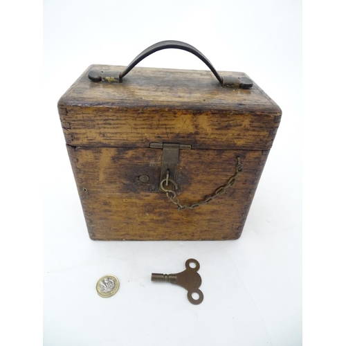 96 - Pigeon Racing : a Toulet 10 bird racing pigeon Clock with oak case , brass fittings and leather carr... 