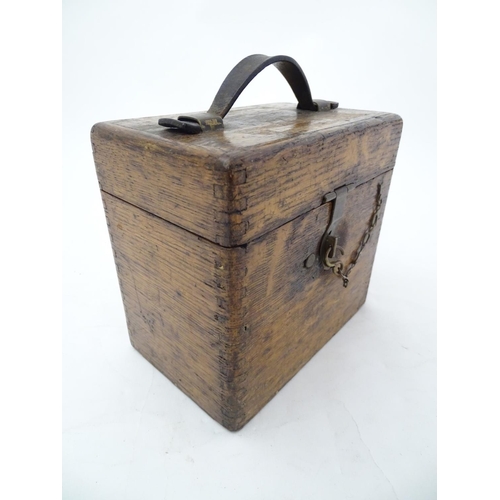 96 - Pigeon Racing : a Toulet 10 bird racing pigeon Clock with oak case , brass fittings and leather carr... 