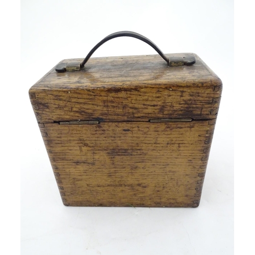 96 - Pigeon Racing : a Toulet 10 bird racing pigeon Clock with oak case , brass fittings and leather carr... 