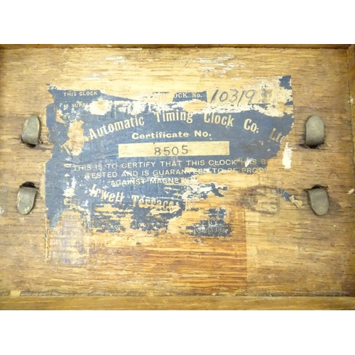 96 - Pigeon Racing : a Toulet 10 bird racing pigeon Clock with oak case , brass fittings and leather carr... 