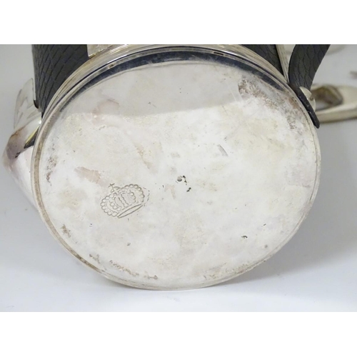 229 - A novelty cocktail shaker formed as a golf bag with stirrers etc formed as golf clubs. 11'' high