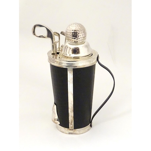 229 - A novelty cocktail shaker formed as a golf bag with stirrers etc formed as golf clubs. 11'' high