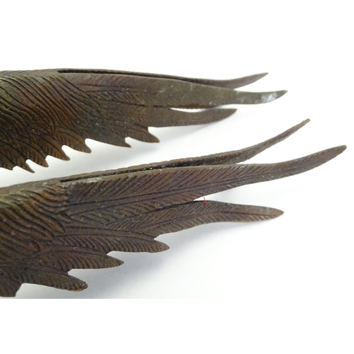 296 - A pair of cast menu holders formed as Lady Amherst pheasants. Largest approx. 11