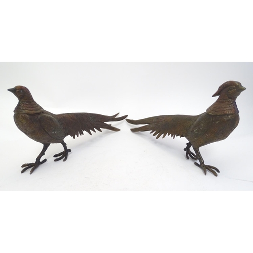 296 - A pair of cast menu holders formed as Lady Amherst pheasants. Largest approx. 11