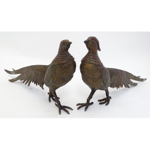 296 - A pair of cast menu holders formed as Lady Amherst pheasants. Largest approx. 11