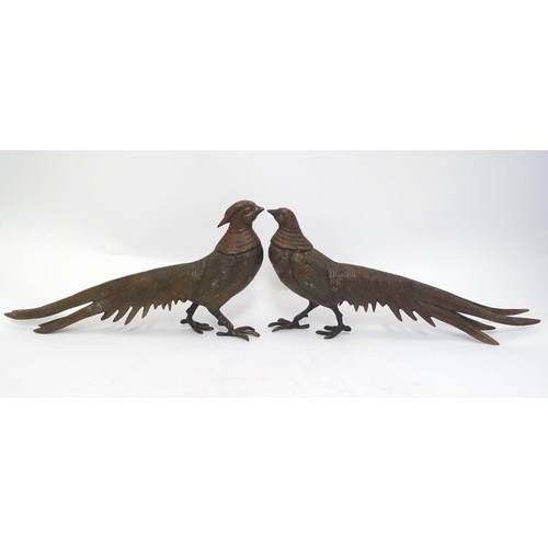 296 - A pair of cast menu holders formed as Lady Amherst pheasants. Largest approx. 11