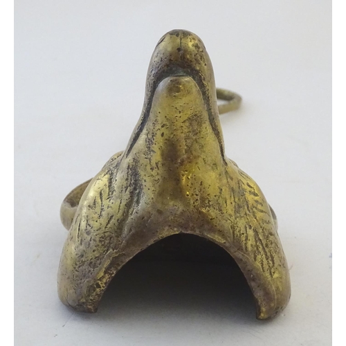 405 - A Victorian cast brass figural doorstop/door porter, hunting themed, formed as a fox mask surmounted... 