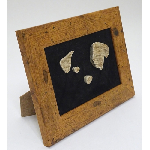 55 - Taxidermy: carved antler sections formed in caricature to suggest the head of a dog, by A. Vankovs, ... 