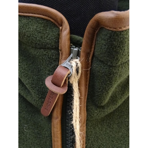311 - A Shooter King green fleece, size L, with tags.
