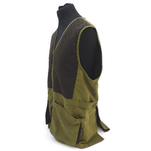 315 - A Laksen olive green skeet vest, size 3XL