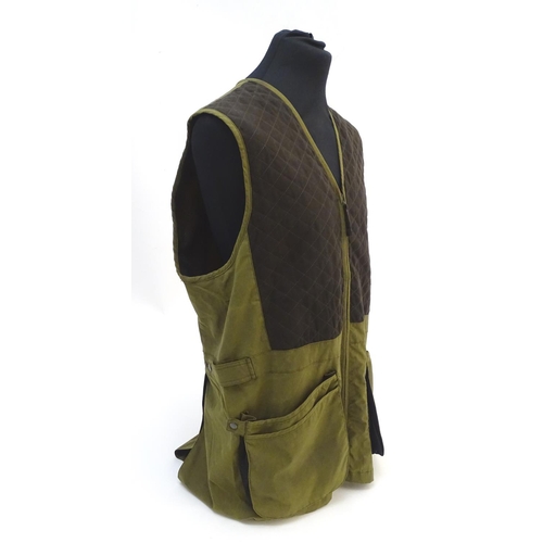 315 - A Laksen olive green skeet vest, size 3XL