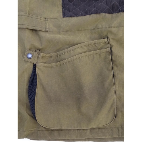 315 - A Laksen olive green skeet vest, size 3XL