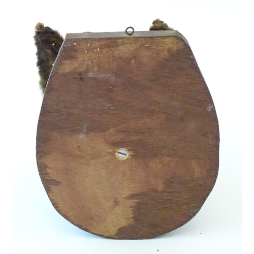 61 - Taxidermy: an early 20thC mount of a Fox (Vulpes Vulpes) mask and brush, affixed to an oak plinth fo... 