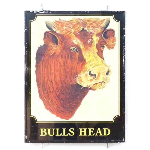 126 - A 20thC pub sign, 'Bull's Head', with printed lettering and illustration of an Ayrshire bull, 44 1/2... 
