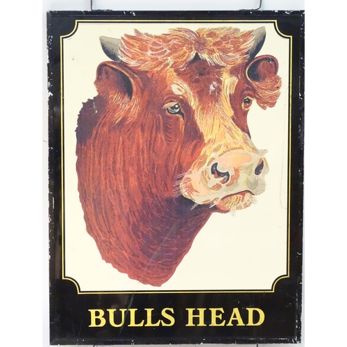 126 - A 20thC pub sign, 'Bull's Head', with printed lettering and illustration of an Ayrshire bull, 44 1/2... 