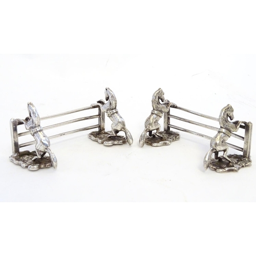 221 - A pair of silver plate knife rests with horse and fence decoration 3 1/2