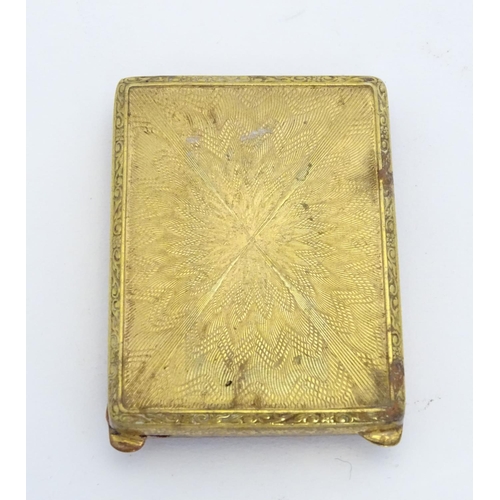 223 - A gilt metal match book case / vesta case with enamel decoration to lid depicting a pheasant in a la... 