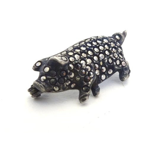 227 - A Vintage white metal brooch formed as a pig set with marcasite detail 1