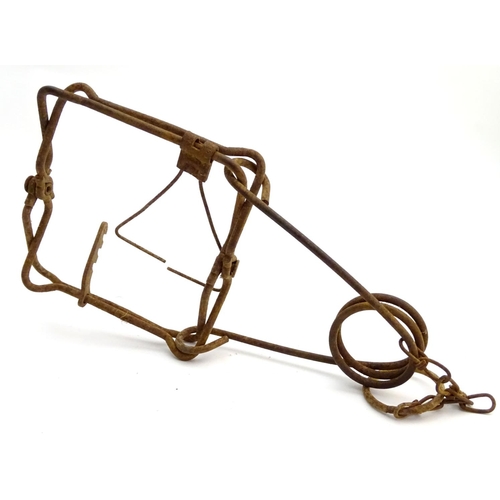 108 - Antique trap: an early 20thC spring rat trap, 10