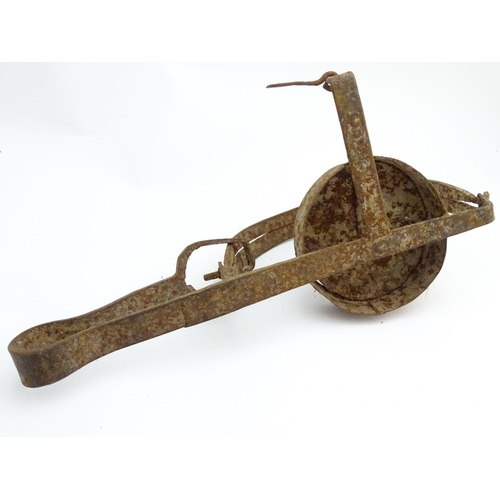 111 - Antique trap: a 19thC large foothold pole trap, with elevated treadle, 15 1/2