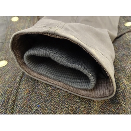 326 - A Musto Woodhall coat, size XXL, with tags