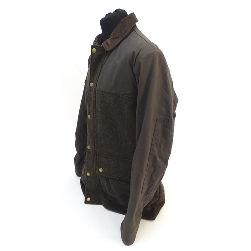 326 - A Musto Woodhall coat, size XXL, with tags
