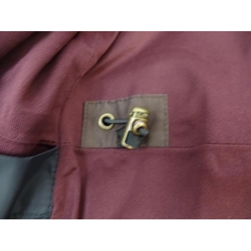 335 - A Musto brown jacket, ladies size 18, with tags