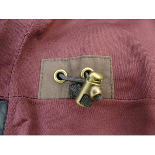 335 - A Musto brown jacket, ladies size 18, with tags