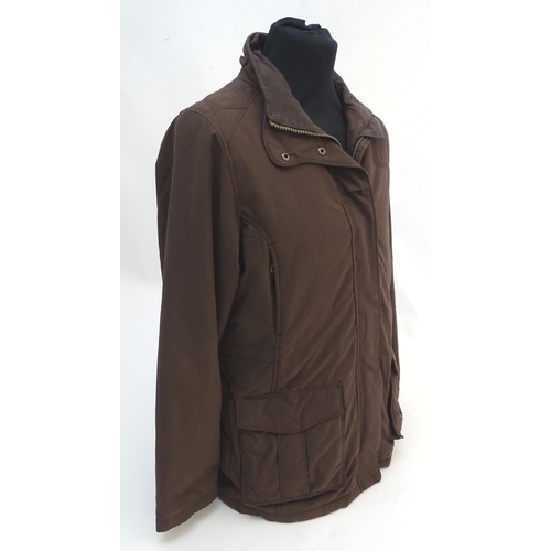 335 - A Musto brown jacket, ladies size 18, with tags