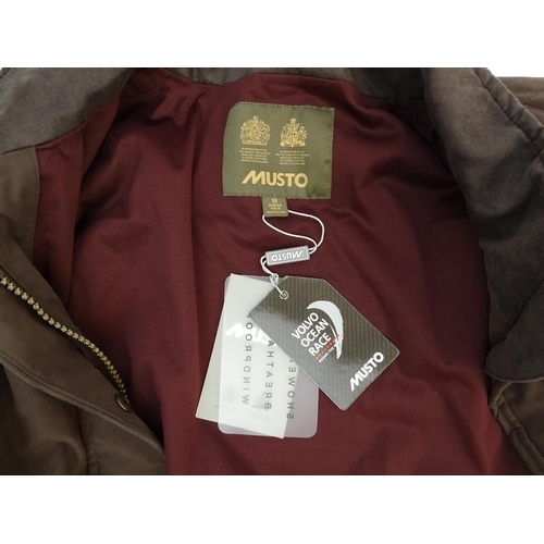 335 - A Musto brown jacket, ladies size 18, with tags