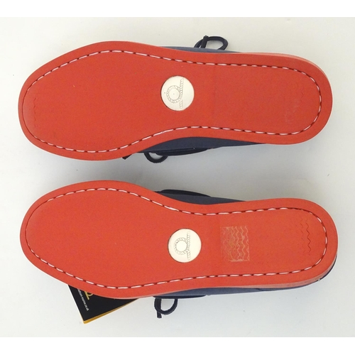 345 - A pair of Chatham red and navy deck shoes, size 9, new in box