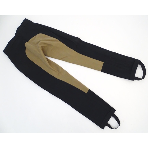 363 - Saddle Huggers by Shires black jodhpurs, ladies size 28, with tags