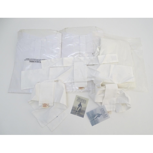 368 - Assorted horse riding items, to include two Dublin ladies show shirts, size EU 42 and EU 40, with ta... 